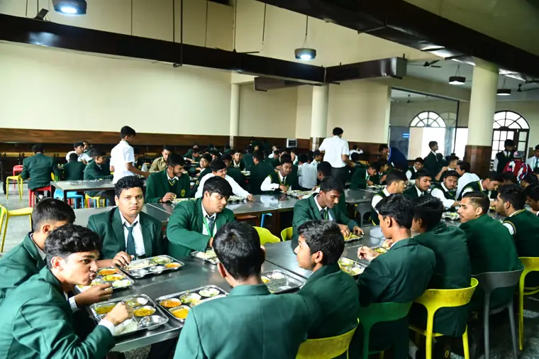 Boarders having a meal together in the dining hall at DPS Chhindwara