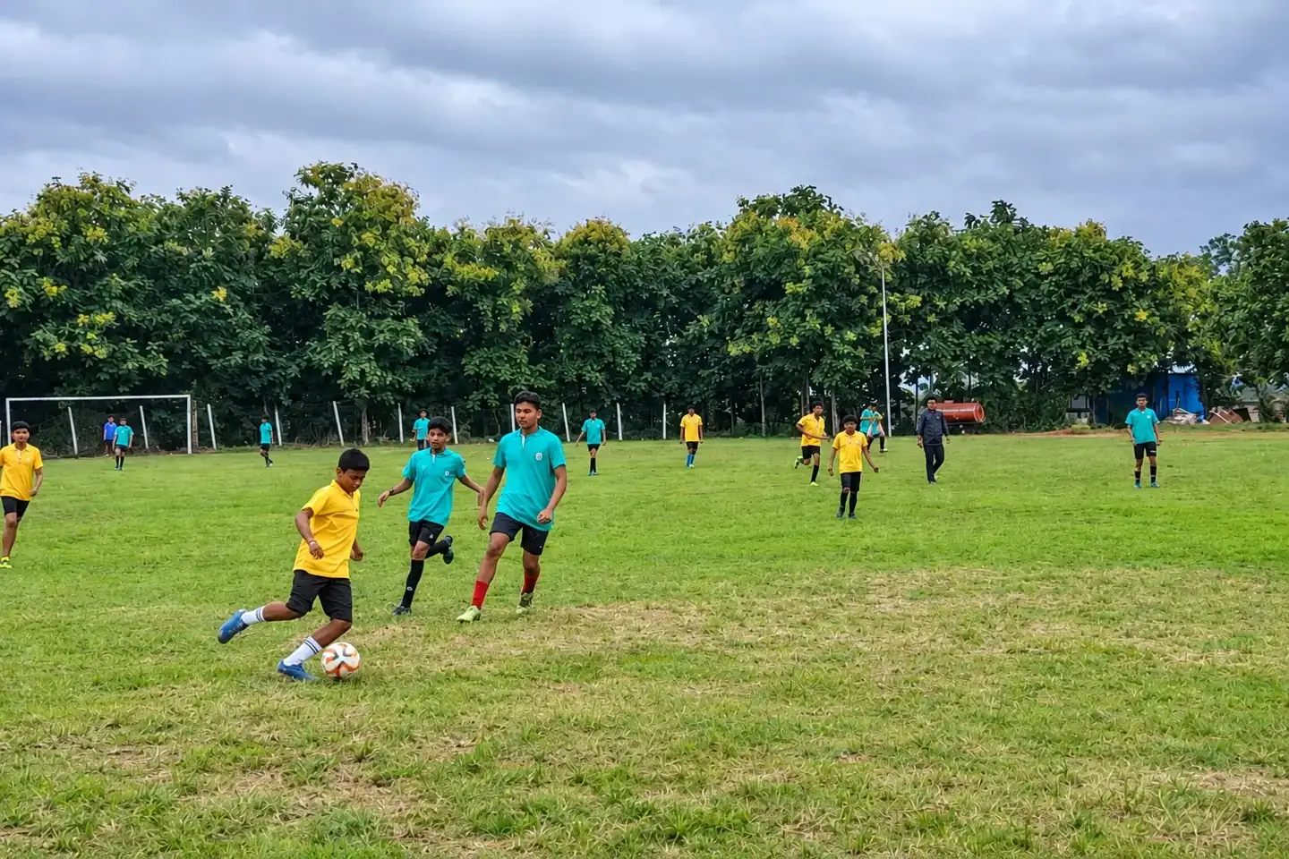 Students playing football on the school ground at DPS Chhindwara